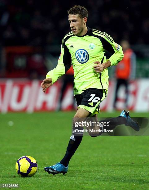 Fabian Johnson of Wolfsburg runs with the ball during the Bundesliga match between Werder Bremen and VfL Wolfsburg at the Weser stadium on November...