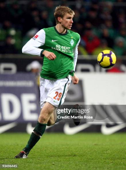 Per Mertesacker of Bremen runs with the ball during the Bundesliga