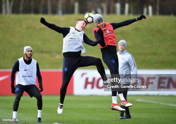 Alfie Mawson and Dele Ali trains during an England training session at St Georges Park on March 20, 2018 in Burton-upon-Trent, England.