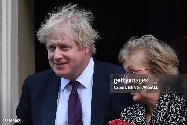 Britain's Foreign Secretary Boris Johnson and Britain's Leader of the House of Commons Andrea Leadsom leave from 10 Downing Street in central London...