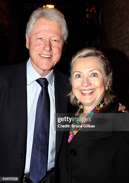 Bill Clinton and Hillary Clinton pose backstage at "39 Steps" on Broadway at The Helen Hayes Theater on November 28, 2009 in New York City.