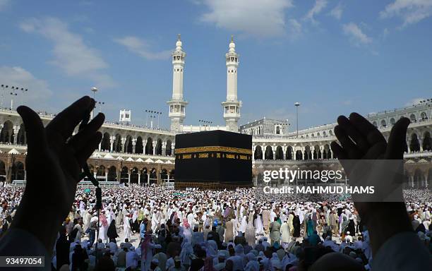 Muslim pilgrims perform the final walk around the Kaaba at the Grand Mosque in the Saudi holy city of Mecca on November 30, 2009. The annual Muslim...
