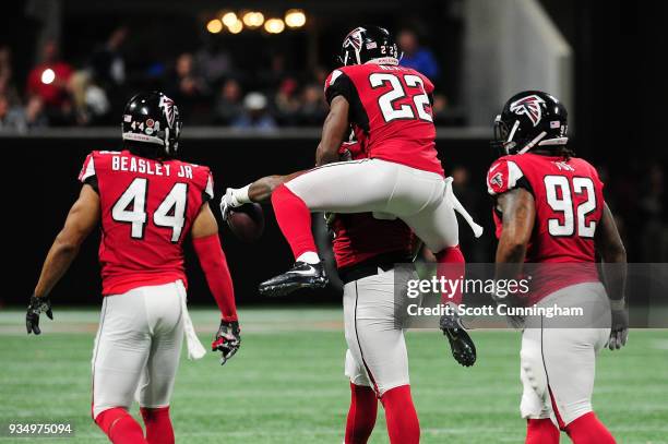 Keanu Neal celebrates with Adrian Clayborn of the Atlanta Falcons against the Dallas Cowboys at Mercedes-Benz Stadium on November 12, 2017 in...