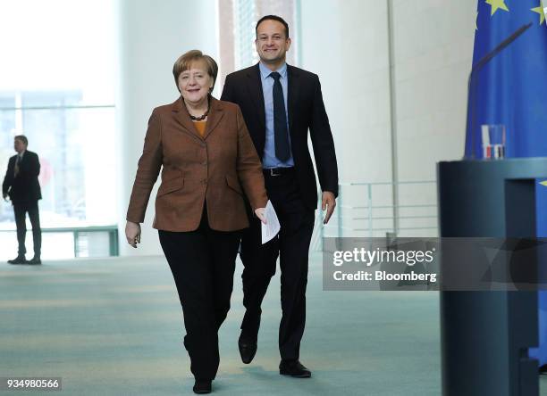 Angela Merkel, Germany's chancellor, left, and Leo Varadkar, Ireland's prime minister, arrive for a news conference inside the Chancellery in Berlin,...