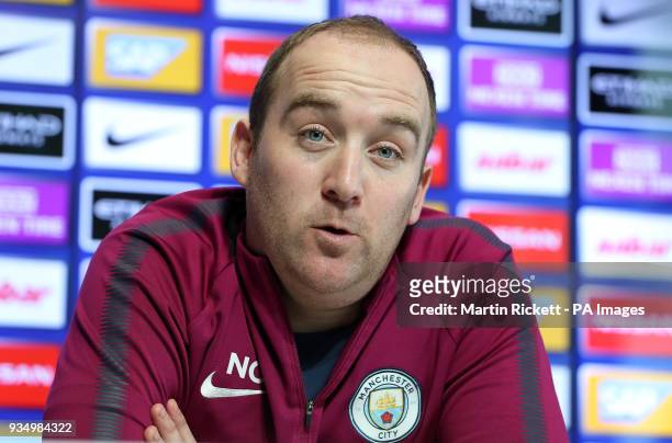 Manchester City Women manager Nick Cushing speaks during a press conference at the City Football Academy, Manchester.