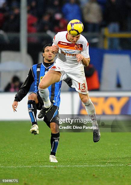 Fabio Giovanni Ceravolo of Atalanta and Marco Motta of Roma during the Serie A match between Atalanta and Roma at Stadio Atleti Azzurri d'Italia on...