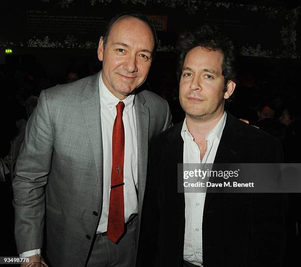 Kevin Spacey and Tom Hollander attend The Old Vic Christmas Cracker in partnership with the "Charities Trust" in aid of The Old Vic Theatre Trust at...