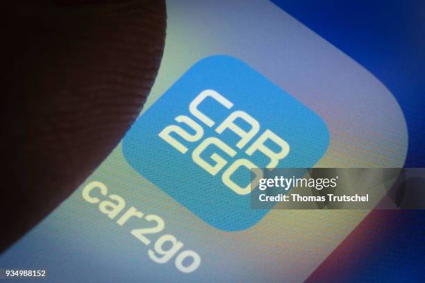 Berlin, Germany In this photo illustration the app of car sharing company car2go is displayed on a smartphone on March 20, 2018 in Berlin, Germany.