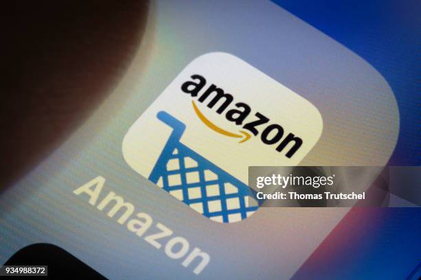 Berlin, Germany In this photo illustration the app of American electronic commerce and cloud computing company amazon is displayed on a smartphone on...