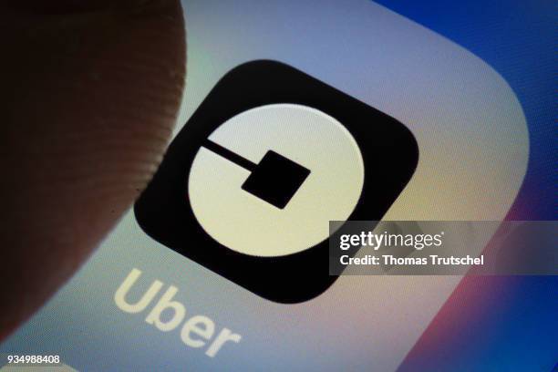 Berlin, Germany In this photo illustration the app of peer-to-peer ridesharing, food delivery, and transportation network company Uber is displayed...