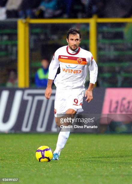 Mirko Vucinic of Roma in action during the Serie A match between Atalanta and Roma at Stadio Atleti Azzurri d'Italia on November 29, 2009 in Bergamo,...