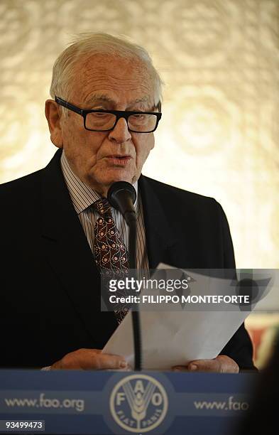Newly named goodwill ambassador of the Food and Agriculture Organization French fashion designer Pierre Cardin delivers a speech during the ceremony...