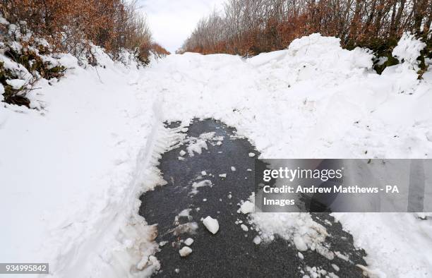 Drifted snow blocks a road heading out of Simonsbath in Exmoor National park, as the icy conditions brought by the &quot;Mini Beast from the...