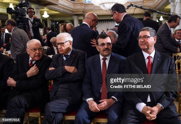 Former Tunisian Prime Ministers Rachid Sfar, Hedi Baccouche, Ali Laarayedh, and Habib Essid attend a ceremony marking the 62nd anniversary of...
