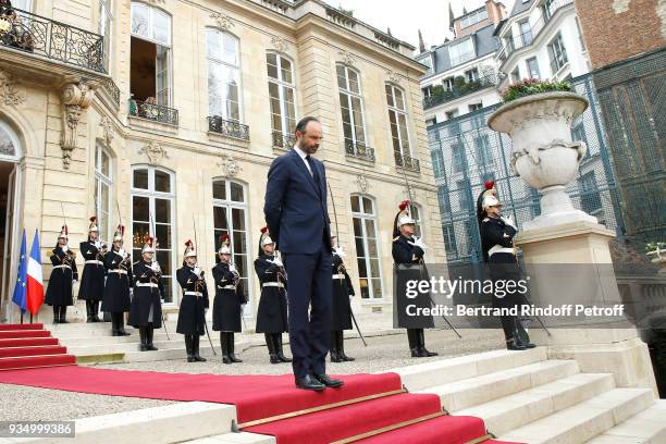 French Prime Minister Edouard Philippe waits for Grand-Duc Henri and Grande-Duchesse Maria Teresa of Luxembourg at "Hotel de Matignon" during their...