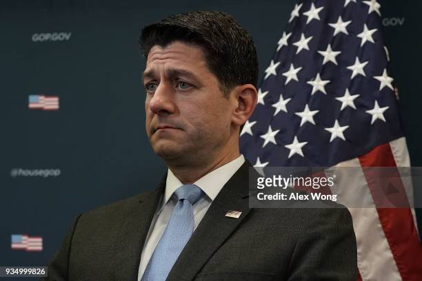 Speaker of the House Rep. Paul Ryan listens during a news briefing after the weekly House Republican Conference meeting March 20, 2018 at the Capitol...