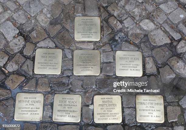 Berlin Some of the "Stolpersteine" memorials to Holocaust victims on March 20, 2018 in Berlin, Germany. "Stolpersteine" are a European-wide project...