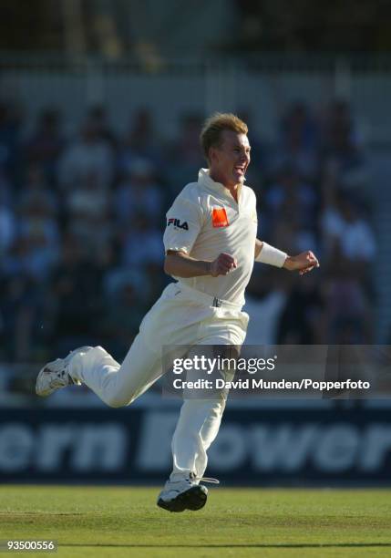 Australian fast bowler Brett Lee is jubilant after taking the wicket of England opening batsman Marcus Trescothick late on the second day of the 3rd...