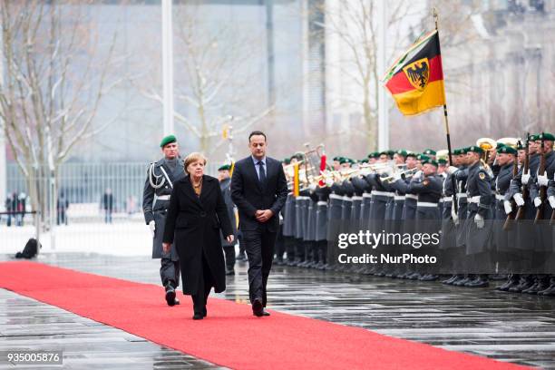 German Chancellor Angela Merkel and Irish Prime Minister Leo Varadkar review the guard of honour at the Chancellery in Berlin, Germany on March 20,...