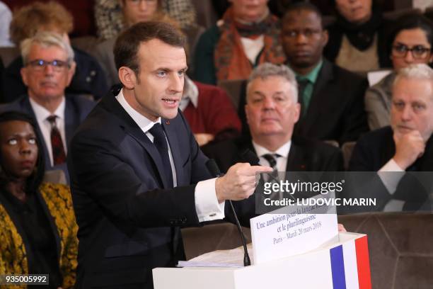 France's President Emmanuel Macron gives a speech to unveil his strategy to promote French as part of the International Francophonie Day before...