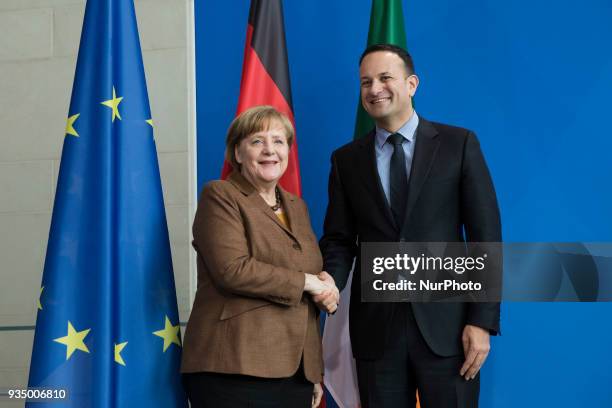 German Chancellor Angela Merkel and Irish Prime Minister Leo Varadkar shake hands after a news conference at the Chancellery in Berlin, Germany on...