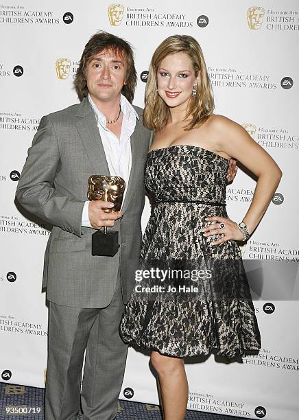 Richard Hammond poses with his award in the press room with Gemma Bissix at the 'EA British Academy Children's Awards 2009' at The London Hilton on...