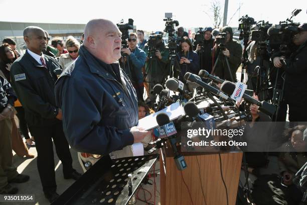 Police Chief Michael Hansen updates the media on their investigation outside a FedEx facility following an explosion on March 20, 2018 in Schertz,...