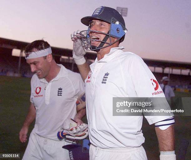 Delighted England captain Nasser Hussain and batsman Graham Thorpe celebrate as England clinch a dramatic victory in near darkness at the end of the...