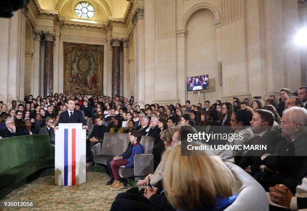 France's President Emmanuel Macron gives a speech to unveil his strategy to promote French as part of the International Francophonie Day before...