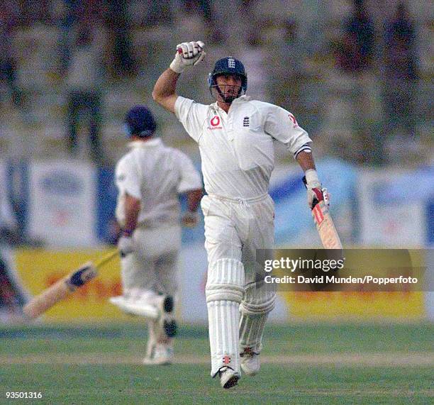 England captain Nasser Hussain celebrates as England clinch a dramatic victory in near darkness at the end of the fifth day of the 3rd Test match...