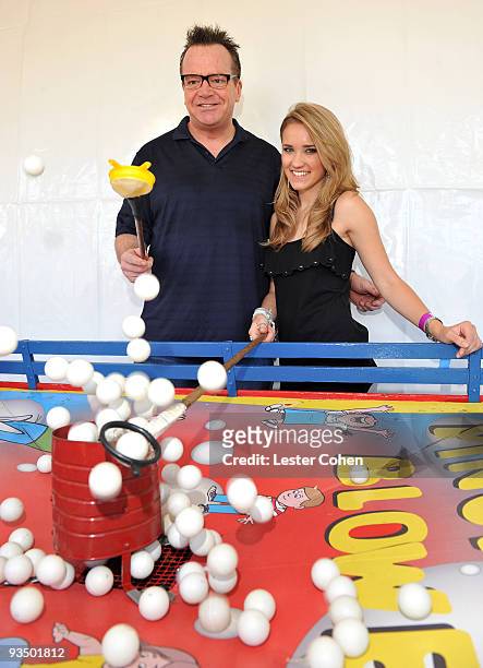 Actor Tom Arnold and actress Emily Osment attend the A Time for Heroes Celebrity Carnival Sponsored by Disney, benefiting the Elizabeth Glaser...
