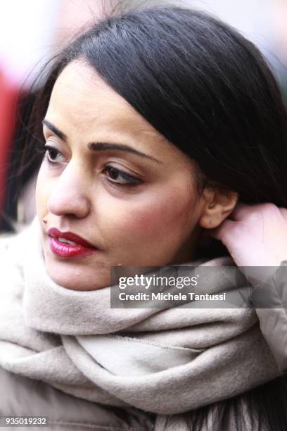 Berlin politician Sawsan Chebli, who is of Palestinian origin, participates in the spring cleaning of "Stolpersteine" memorials to Holocaust victims...