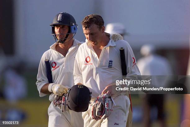England captain Nasser Hussain and Michael Atherton leave the field at the end of the second day of the 2nd Test match between South Africa and...