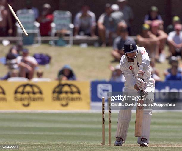 England batsman Michael Atherton is bowled by Shaun Pollock for 3 on the fifth day of the 2nd Test match between South Africa and England at the St...