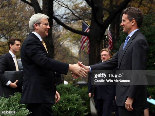 Treasury Secretary Timothy Geithner greets Australian Prime Minister Kevin Rudd outside the Treasury Building November 30, 2009 in Washington, DC....