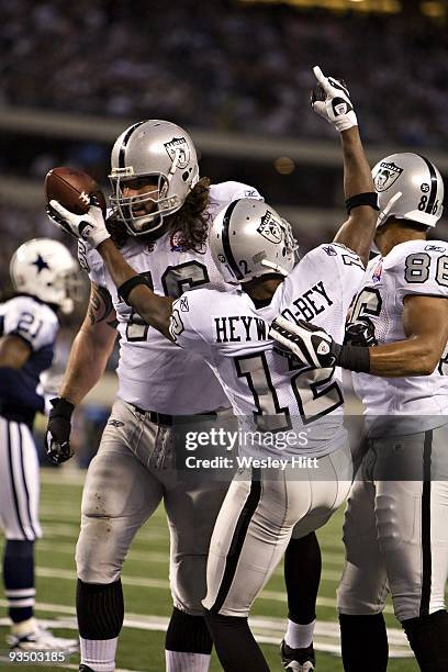 Wide receiver Darrius Heyward-Bey of the Oakland Raiders celebrates after a touchdown against the Dallas Cowboys at Cowboys Stadium on November 26,...