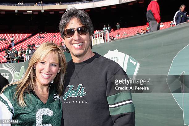 Actor Ray Romano and singer and former WWE RAW personality Lilian Garcia check out the action from the New York Jets sideline during the Carolina...