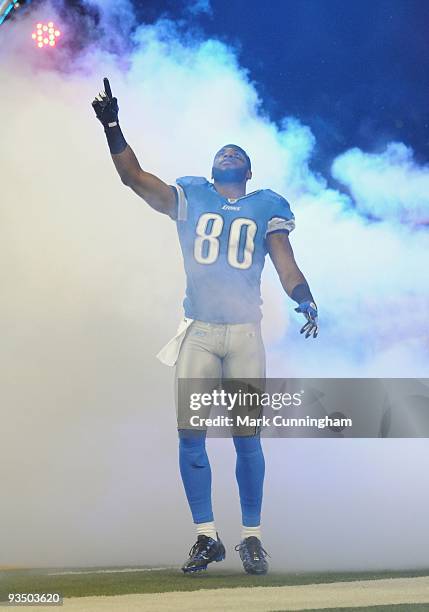 Bryant Johnson of the Detroit Lions points into the air during player introductions before the game against the Green Bay Packers at Ford Field on...