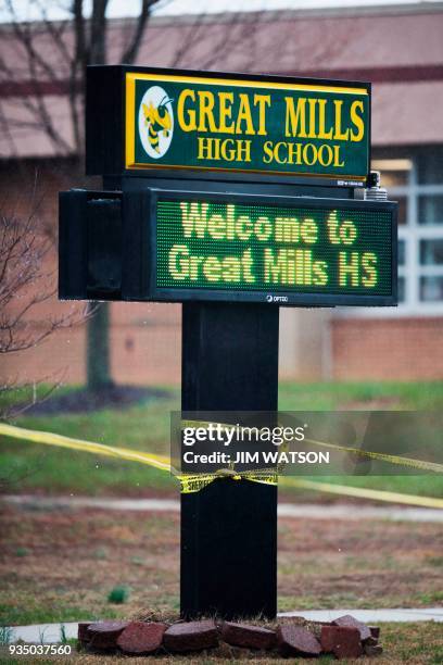 Sign is seen in front of the Great Mills High School in Great Mills, Maryland after a shooting at the school on March 20, 2018 . A shooting took...