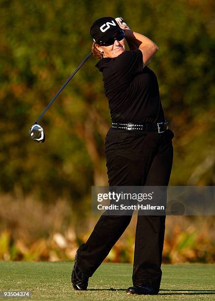 Lorie Kane hits her tee shot on the 13th hole during completion of the weather-delayed second round of the LPGA Tour Championship presented by Rolex...