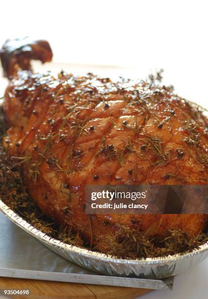 glazed whole leg of ham - cloves stock pictures, royalty-free photos & images