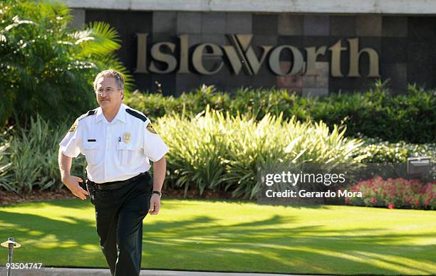 Security guard watches from the gate of the Isleworth community, which is home to Tiger Woods on November 30, 2009 in Windermere, Florida. Tiger...