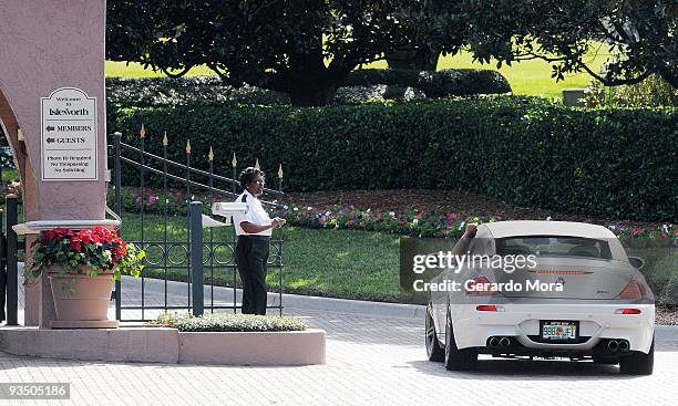 Security guard watches from the gate of the Isleworth community, which is home to Tiger Woods, on November 30, 2009 in Windermere, Florida. Tiger...