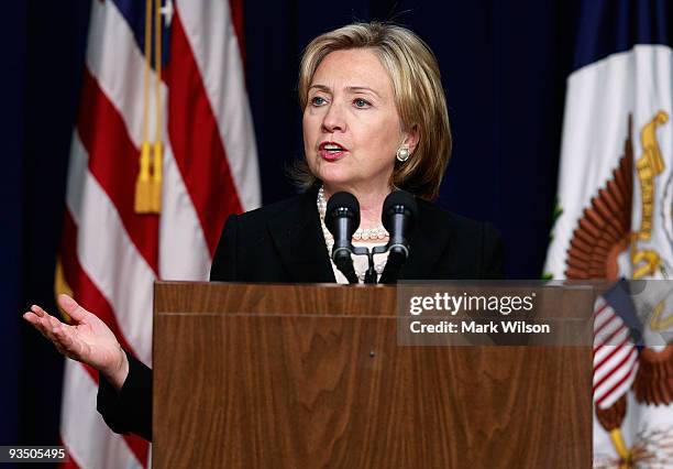 Secretary of State Hillary Rodham Clinton speaks at a news conference on the AIDS virus with Secretary of Health and Human Services Kathleen Sebelius...