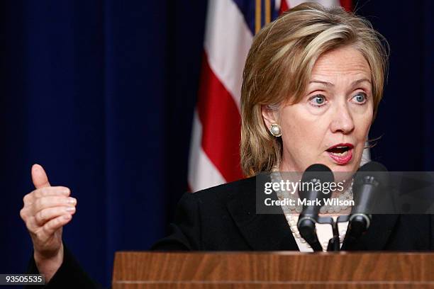 Secretary of State Hillary Rodham Clinton speaks at a news conference on the AIDS virus with Secretary of Health and Human Services Kathleen Sebelius...