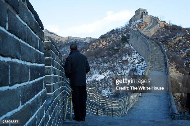 In this handout provided by the White House, President Barack Obama tours the Great Wall November 18, 2009 in Badaling, China. Obama made an official...