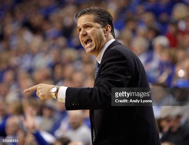 John Calipari the Head Coach of the Kentucky Wildcats gives instructions to his team during the game against the Sam Houston State Bearkats at Rupp...