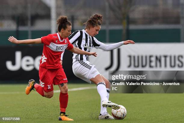 Cecilia Salvai of Juventus Women is challenged during the serie A match between Juventus Women and Pink Bari at Juventus Center Vinovo on March 17,...