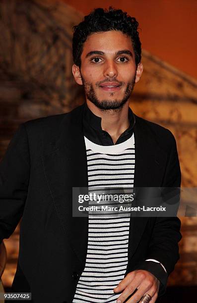 Mehdi Dehbi poses at the premiere of "'La Folle Histoire d'Amour de Simon Eskenazy" -at Cinema Gaumont Capucine on November 30, 2009 in Paris, France.