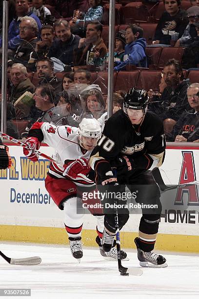 Corey Perry of the Anaheim Ducks moves the puck against the Carolina Hurricanes during the game on November 25, 2009 at Honda Center in Anaheim,...